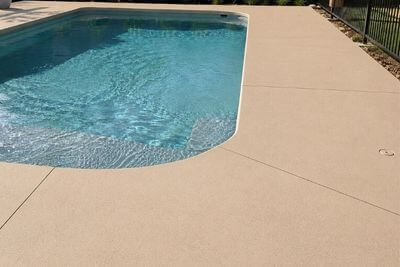 Concrete around pool at home in Penrith