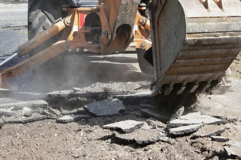 excavation of old concrete driveway