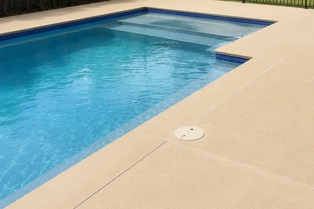 light coloured concretepool surround